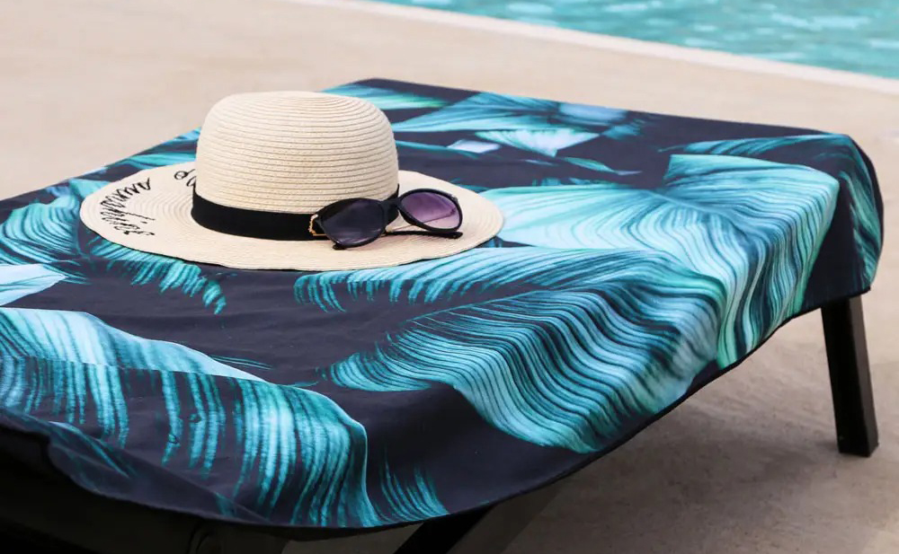 Serviette de plage avec plantes