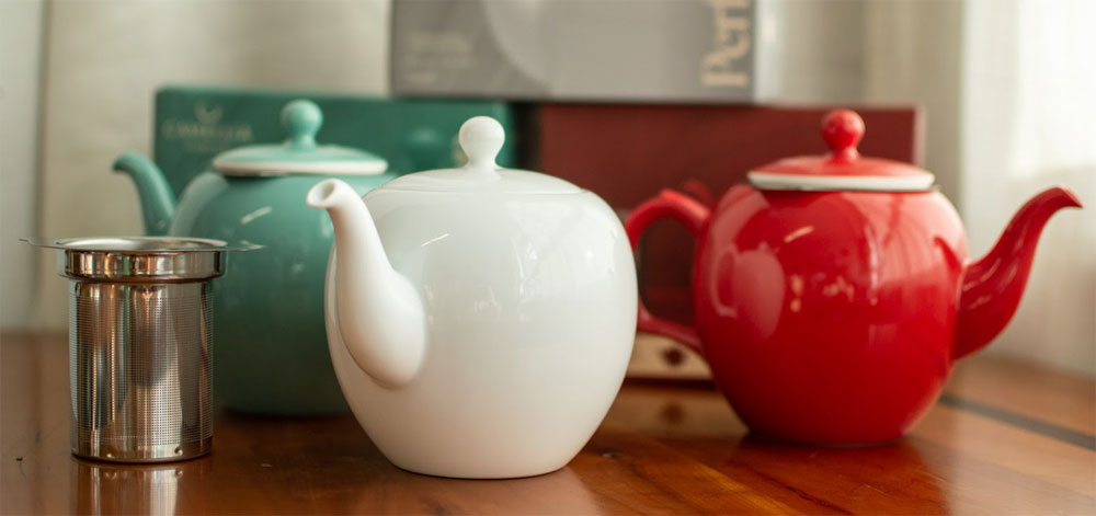 Théière blanche pour le thé Camellia Sinensis