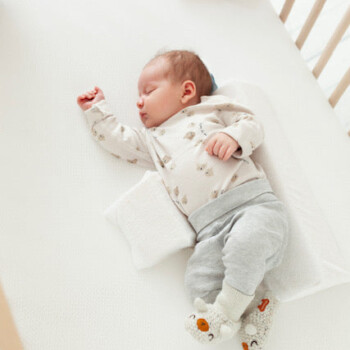Coussin de positionnement latéral pour bébé