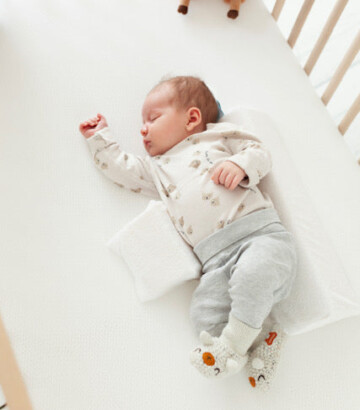 Coussin de positionnement latéral pour bébé