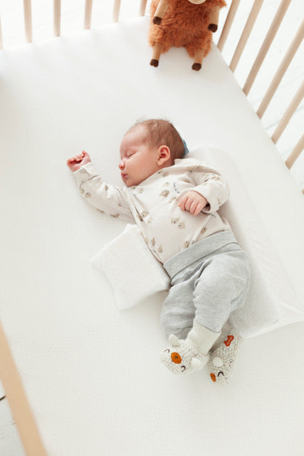 Coussin de positionnement latéral pour bébé
